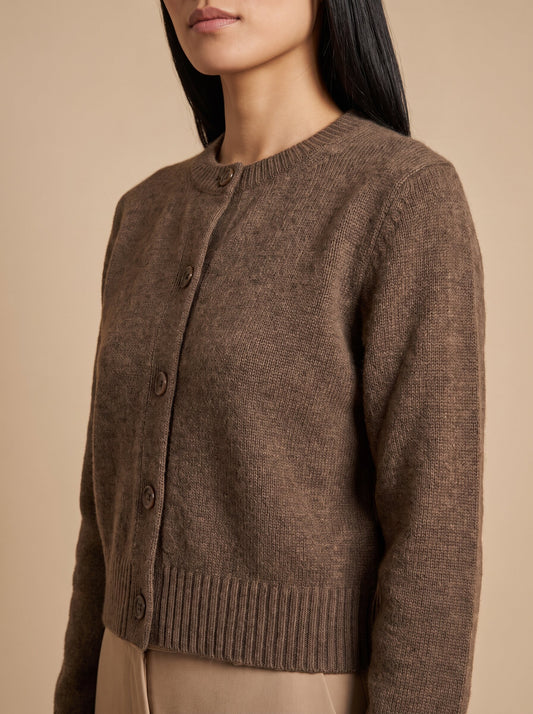Women's cropped button up cardigan in brown, side view